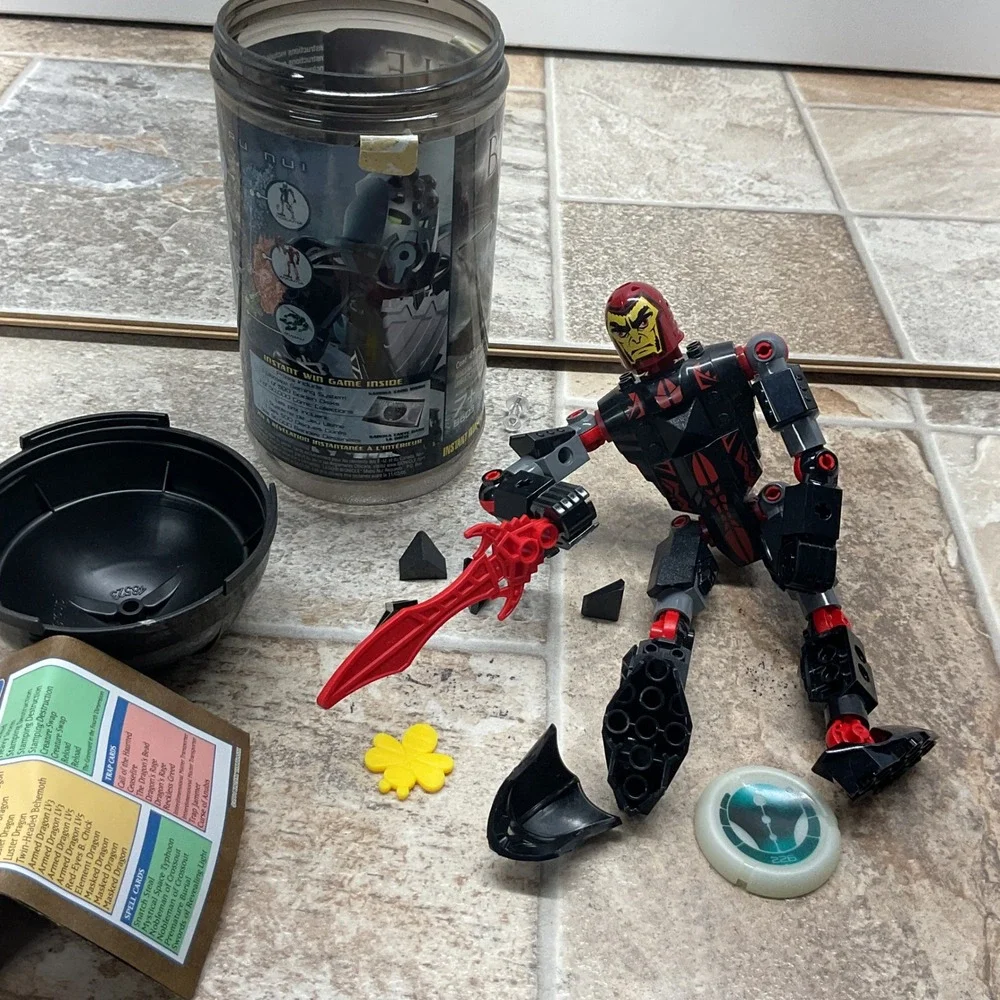LEGO Bionicle 8603 Toa Whenua Metru Nui Figure with Canister and Kanoka Disk